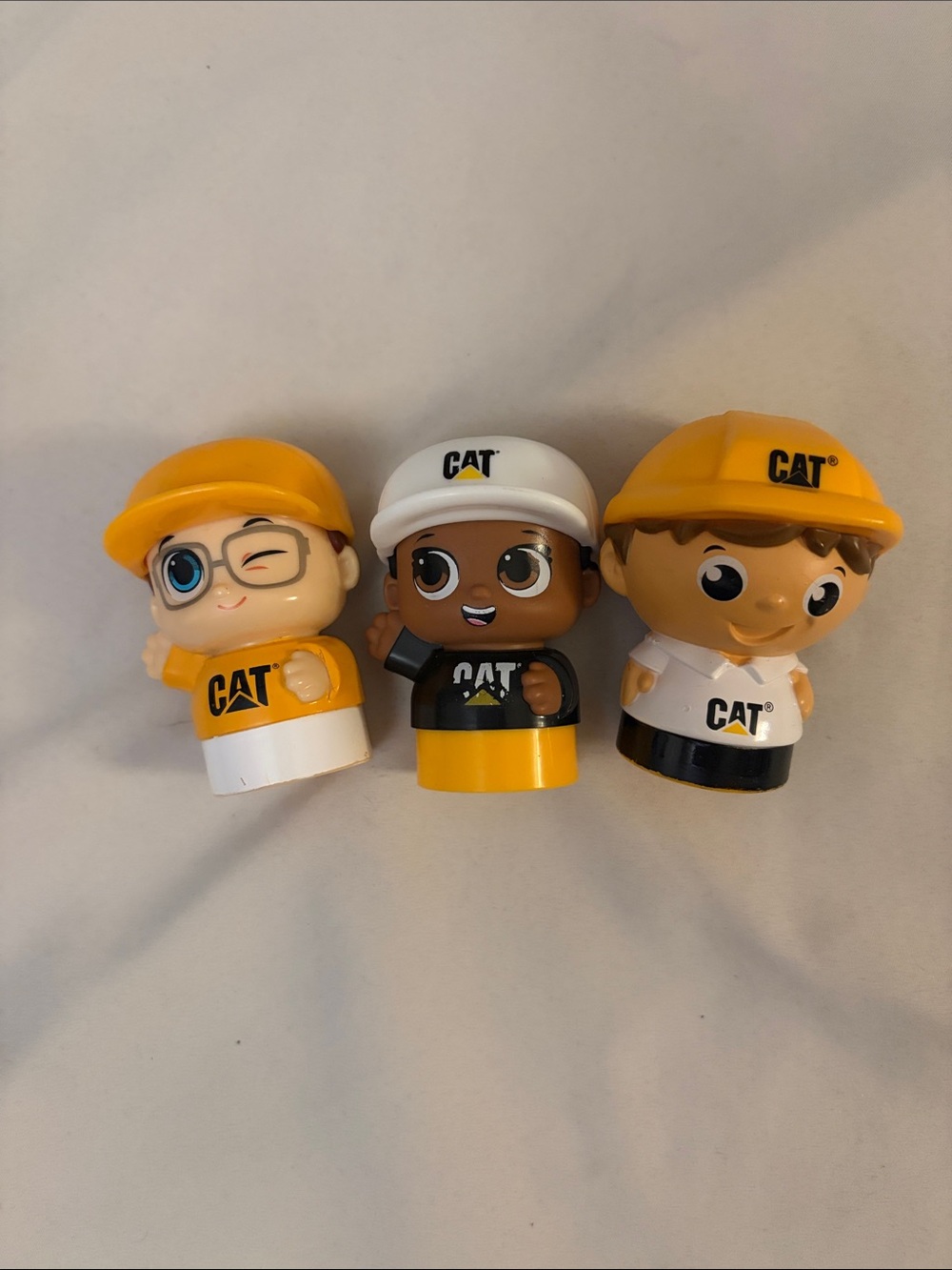 Caterpillar Yellow, White & Black Construction Worker Figure Set